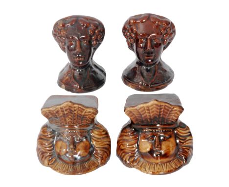 Two pairs of 19th Century treacle glaze sash window sill stops, comprising a pair modelled as a male head and shoulders, poss