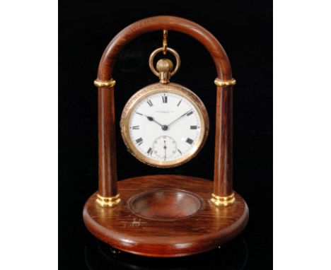 An early 20th Century 9ct gentleman's open face crown wind pocket watch, the white enamel dial with Roman numerals and subsid