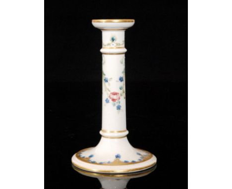 A William Moorcroft for Macintyre & Co candlestick decorated in the Rose and Forget-Me-Not pattern, height 18cm, S/D