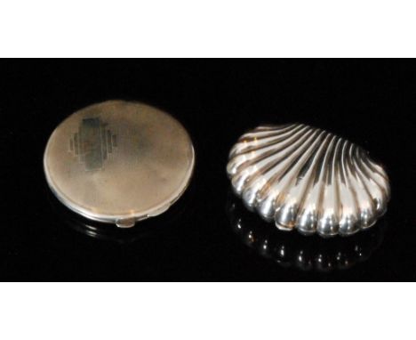 A hallmarked silver box modelled as a clam shell, length 7cm, marks worn, together with an Art Deco silver circular compact, 