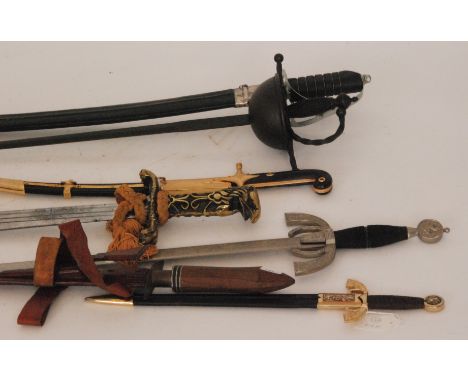 A replica short sword with brass eagle handle and hilt, two Toledo short swords together with a replica sabre of General Jose