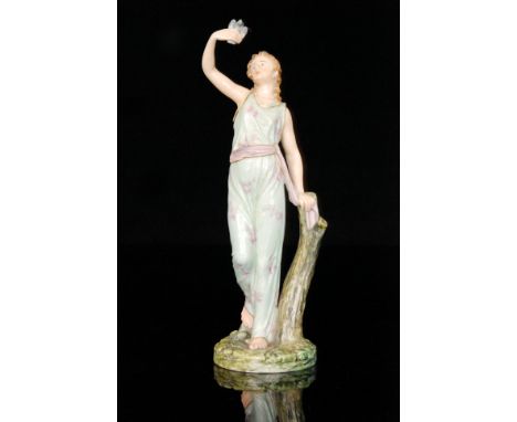 Three Royal Worcester figurines comprising 'Captivity' modelled as a maiden dressed in robes holding aloft a dove in her hand