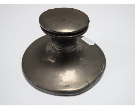 A Hallmarked Silver Capstan Inkwell, (marks rubbed) the hinged lid engraved "H.M.S Worcester Sports 1921 1st Prize 100yds Jun