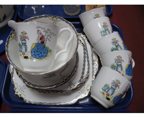 A c.1930's Wellington China Part Tea Set, printed and painted with a garden scene within black and white chequered border, co