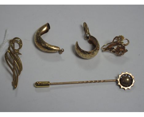 A Modern Openwork Brooch, stamped "375", a stick pin, an odd earring stamped "14K" and a pair of 9ct gold clip earrings (one 