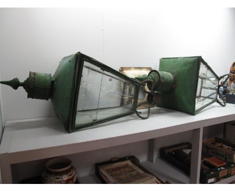 A Pair of Painted Copper Street Gas Lamp Covers, with turned finials, glazed sliding panels (one absent) on iron support, bea