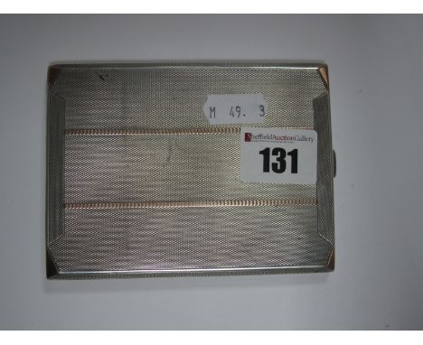 A Silver Engine Turned Cigarette Case, with 9ct gold inlay, Birmingham 1935.
