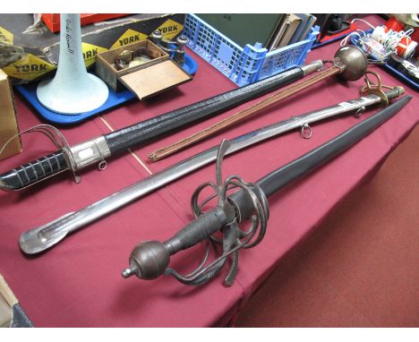 Four Reproduction Wall Hanging Swords, with scrolled guards, overall 108cm each with scabbard and smaller. (4)
