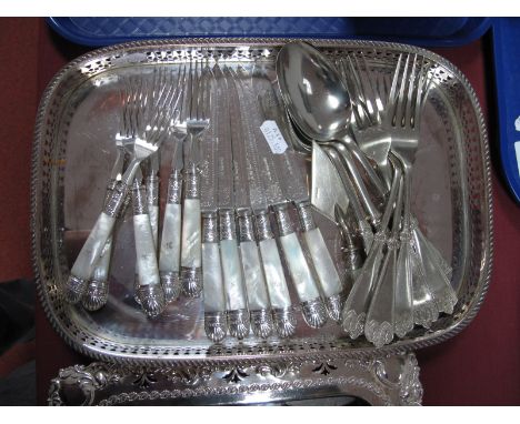 A Decorative Set of Six Mother of Pearl Handled Dessert Knives and Forks, "Roumanian Silver" spoons, "Afghan Silver" forks, m