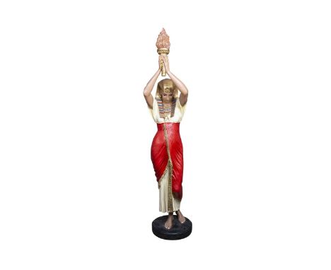 NEAR LIFE SIZE COMPOSITION FIGURAL LAMP, modelled in the form of a hand maiden, her head bowed, her two arms raised supportin
