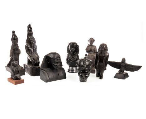 BLACK COMPOSITION FIGURE OF ISIS, modelled kneeling with arms outstretched, 24 cm wide; along with eight other composition an