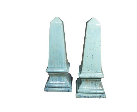 A PAIR OF CERAMIC TURQUOISE GLAZED OBELISKS, 70 cm high