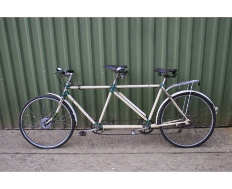 A Gent's tandem bicycle,21 inch frame, hand painted cream with green lugs, one L72 Lycett saddle and another leather saddle, 