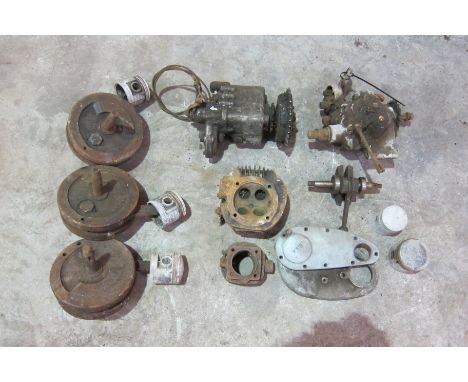 A quantity of engine and gearbox componentsincluding a Norton 'Dolls Head' type gearbox, an unidentified gearbox, four cranks