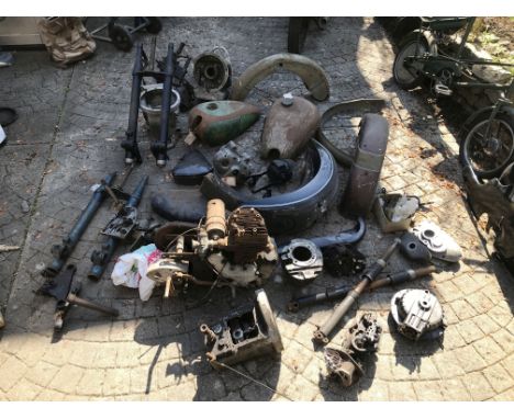 An autojumblers lotincluding Royal Enfield engine and gearbox, believed Sunbeam S7 or S8 engine, various gearboxes, petrol ta