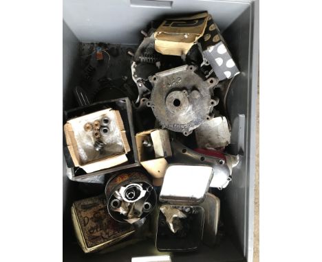 An autojumblers lotincluding engine plates, JAP crankcases, mica sparkplugs, gears, valve springs, bearings and sundry spares