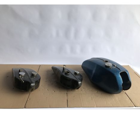 Three Petrol Tankstwo believed Vintage Triumph and the other 1970's Triumph/BSA, condition and completeness unknown, close in
