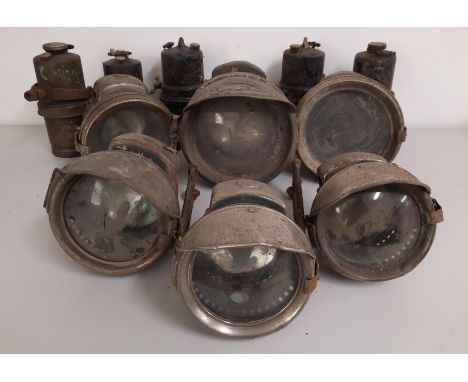 Two Vintage motorcycle P&amp;H acetylene headlampstogether with other assorted lamps, condition and completeness unknown, clo
