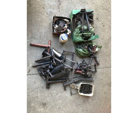A large quantity of mostly fork related componentsincluding handlebar clamps, yokes, fork-links, springs and sundry component