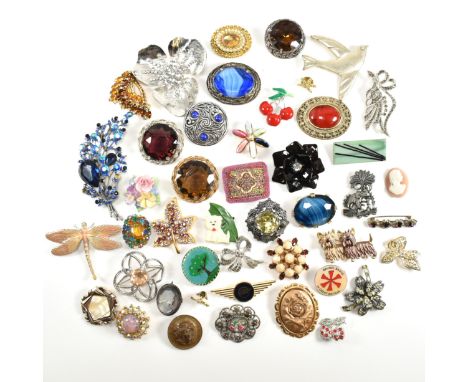 A large collection of costume brooch pins, pins, and stick pin. To include rhinestone set spray brooch pins, cabochon gem set