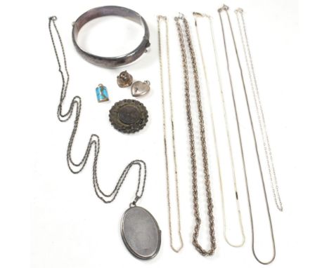 A collection of silver jewellery. The lot to include four silver chain necklaces, including two snake chains, a twist chain a