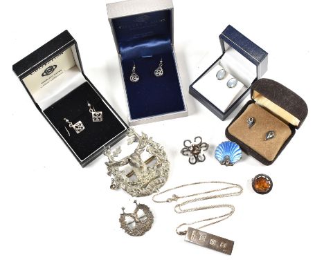 Collection of silver and white metal jewellery. The jewellery to include four pairs of silver earrings, a silver ingot pendan