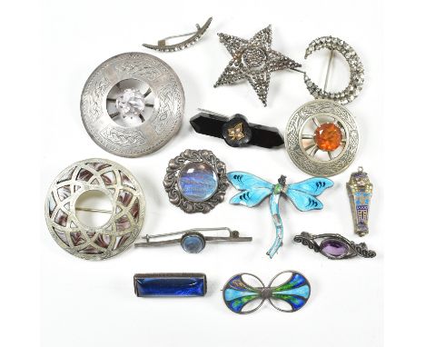 A collection of 19th and 20th-century silver and metal brooch pins. The pins to include three Scottish broochs including one 