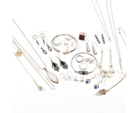 A collection of silver jewellery. The jewellery to include rings, earrings, necklaces and bangles. The silver necklaces to in