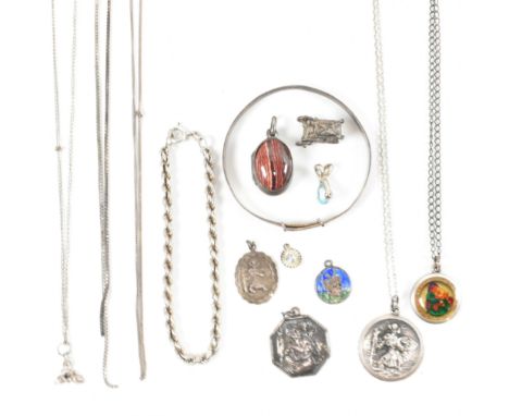 A collection of silver jewellery and fragments. The lot to include a silver engraved bangle, marked sterling silver to inner 
