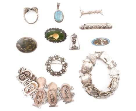 A collection of silver jewellery including Egyptian revival. The lot to include two silver Egyptian revival panel bracelets, 