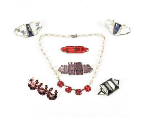 A collection of paste, Vauxhall glass and mother of pearl jewellery. The jewellery to include four buckles, a horseshoe brooc