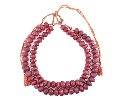 Two ruby faceted composite stone necklaces. The ruby faceted composite stone necklaces comprised with faceted graduating ston