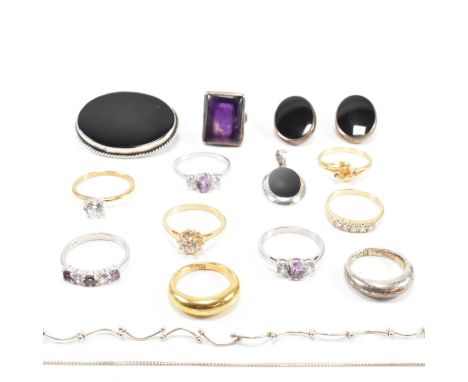 A collection of silver and gem set and yellow tone metal jewellery. The jewellery to include a suite of silver and black enam
