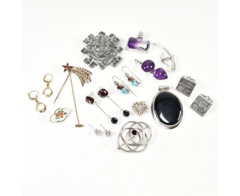 A collection of silver and white tone metal gem set jewellery. The lot to include a hallmarked silver gilt shooting star stic