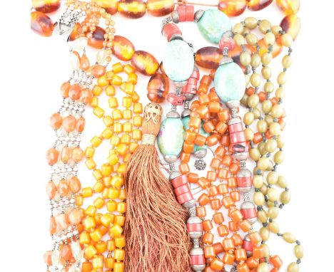 A collection of vintage beaded necklaces. The lot to include a Tibetan style necklace with coral beads and simulated turquois