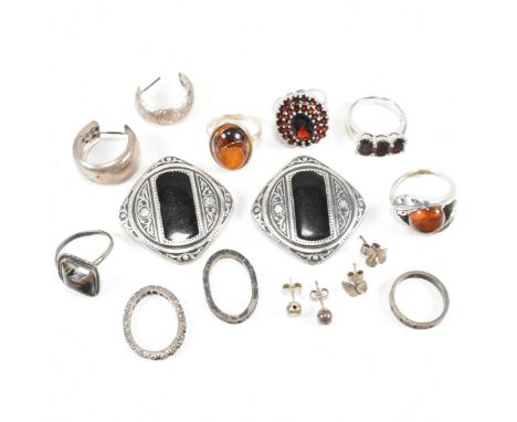 A collection of silver and gem set rings and earrings AF. The lot to include a hallmarked silver and amber cross over ring, h