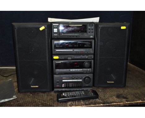 A TECHNICS SC-CH700 HI FI WITH MANUAL AND REMOTE, including amp, sound controller, CD, tape and a pair of matching speakers (