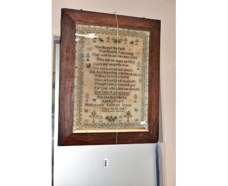 A FRAMED AND GLAZED VICTORIAN NEEDLEWORK SAMPLER, sewn by Elizabeth Willetts aged 9 years of Halesowen National School, dated