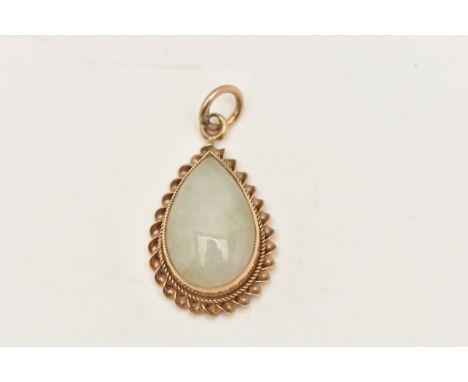 A 9CT GOLD JADE PENDANT, of a pear drop shape, set with a pear cut jade cabochon, collet set within a fine rope twist surroun