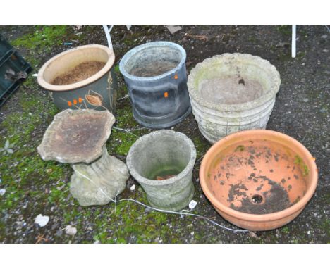 A COLLECTION OF GARDEN POTS AND ORNAMENTS,including a modern composite bird bath, height 34cm, two modern composite pots (one