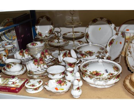 A SIXTY PIECE ROYAL ALBERT 'OLD COUNTRY ROSES' DINNER SERVICE, and five pieces of giftware, comprising two tureens, a saucebo