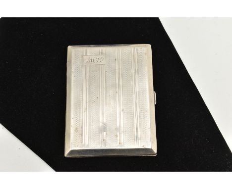 AN EARLY 20TH CENTURY SILVER CIGARETTE CASE, of a rectangular form, engine turned pattern with engraved cartouche, push butto
