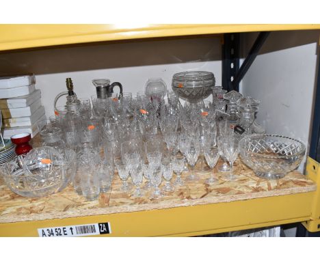 A LARGE QUANTITY OF ASSORTED CRYSTAL CUT GLASSWARE to include a quantity of Richardsons aperitif glasses, Brierley flutes, tw