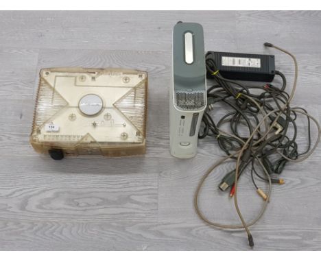AN ORIGINAL XBOX CRYSTAL CONSOLE TOGETHER WITH XBOX 360, PARTS ONLY