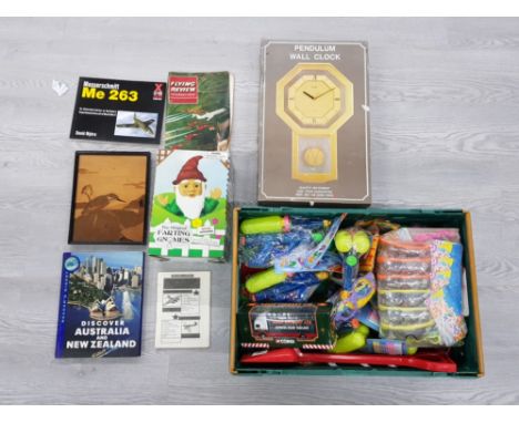 BOX OF KIDS TOYS INCLUDING WATER GUNS AND SUNGLASSES WITH A PENDULUM WALL CLOCK AND OTHER MISCELLANEOUS ITEMS