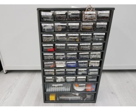 A TOOL ACCESSORY METAL CABINET WITH CONTENTS