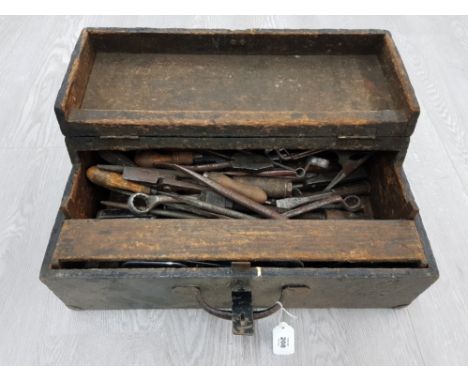 A VINTAGE WOODEN TOOLBOX WITH CONTENTS