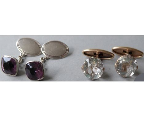 A pair of Russian silver rock crystal cufflinks stamped 825 together with a pair of silver cuff-links with smokey quartz inla