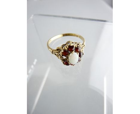 DRESS RING, centre opal and garnet cluster, R fit, 2.4gms (one missing garnet)