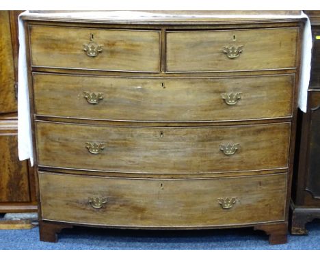 GEORGIAN MAHOGANY BOW FRONT CHEST of two short over three long drawers on bracket corner feet, 110cms height, 126cms width, 5